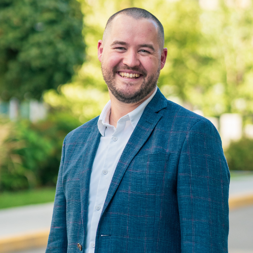 Kristian de Pont, CEO and Founder of Good Sorts Property Services, smiling in nature