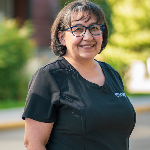 Tammy Smith, Quality Assurance & Training Coordinator at Good Sorts Property Services, smiling in nature